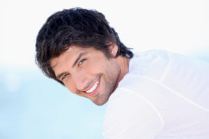 Decorative image of an attractive person with white smile.